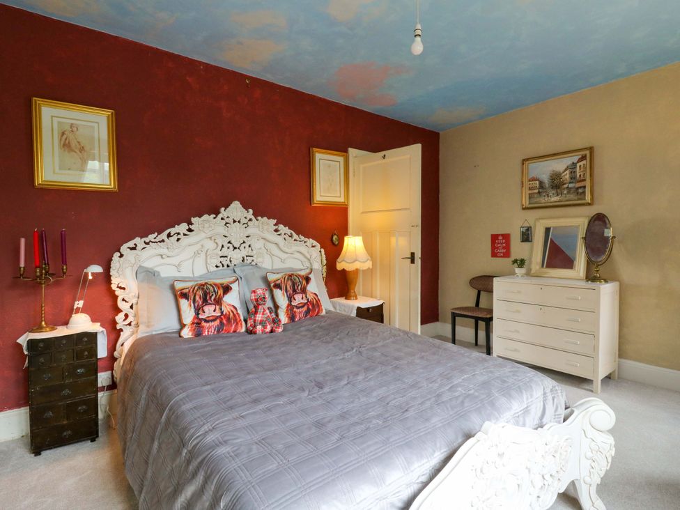 A bedroom with a bed and furniture at Hillside in High Wycombe