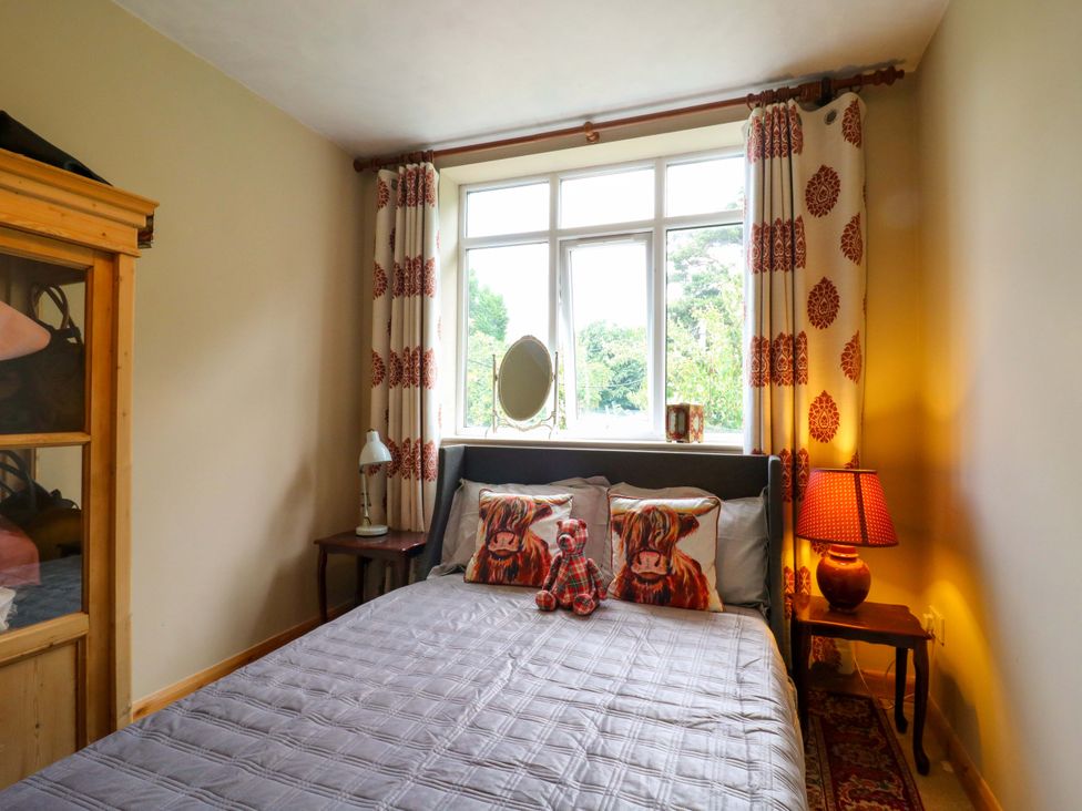 A bedroom with a bed and pillows at Hillside in High Wycombe