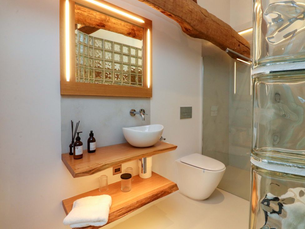 A bathroom with a sink and toilet at Carden Laithe Barn in Threshfield