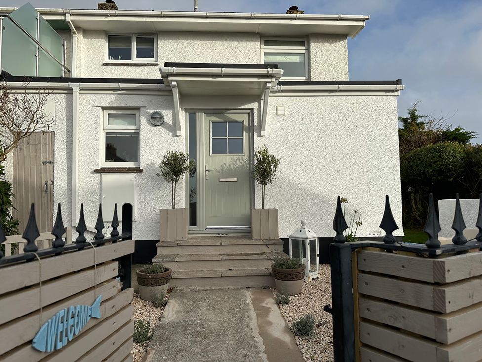 An outdoor entrance with steps and plants at Thurlestone, 1 Island View Thurlestone