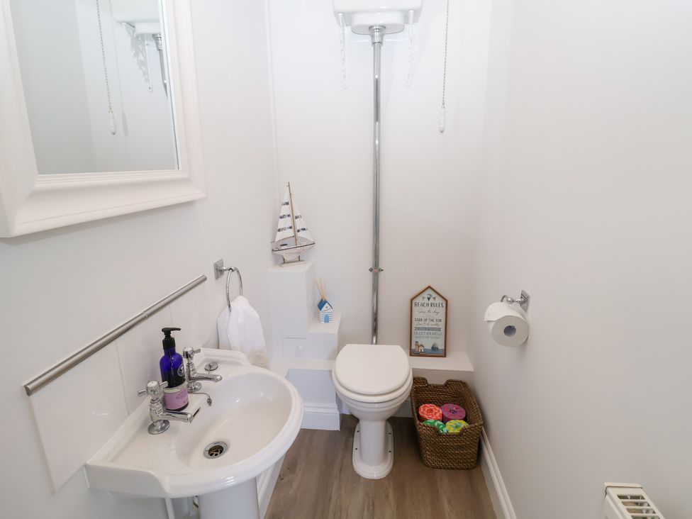 A bathroom with a sink and a toilet at Old Felixstowe, Bath Road, Felixstowe, Suffolk