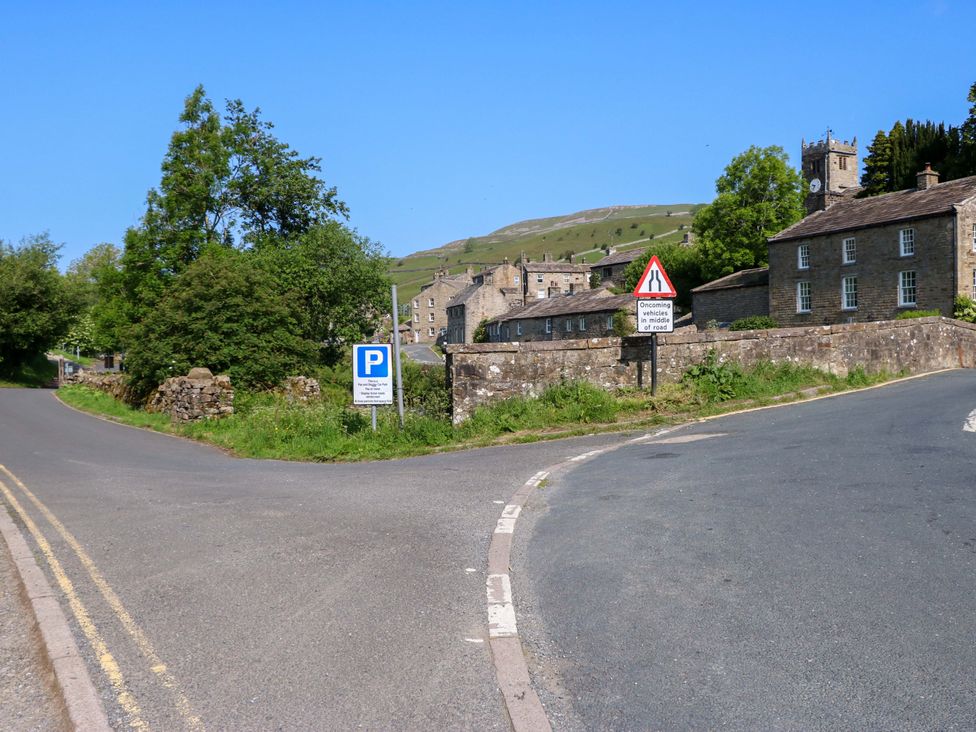 A road junction with buildings and trees at The Old Dairy in Richmond
