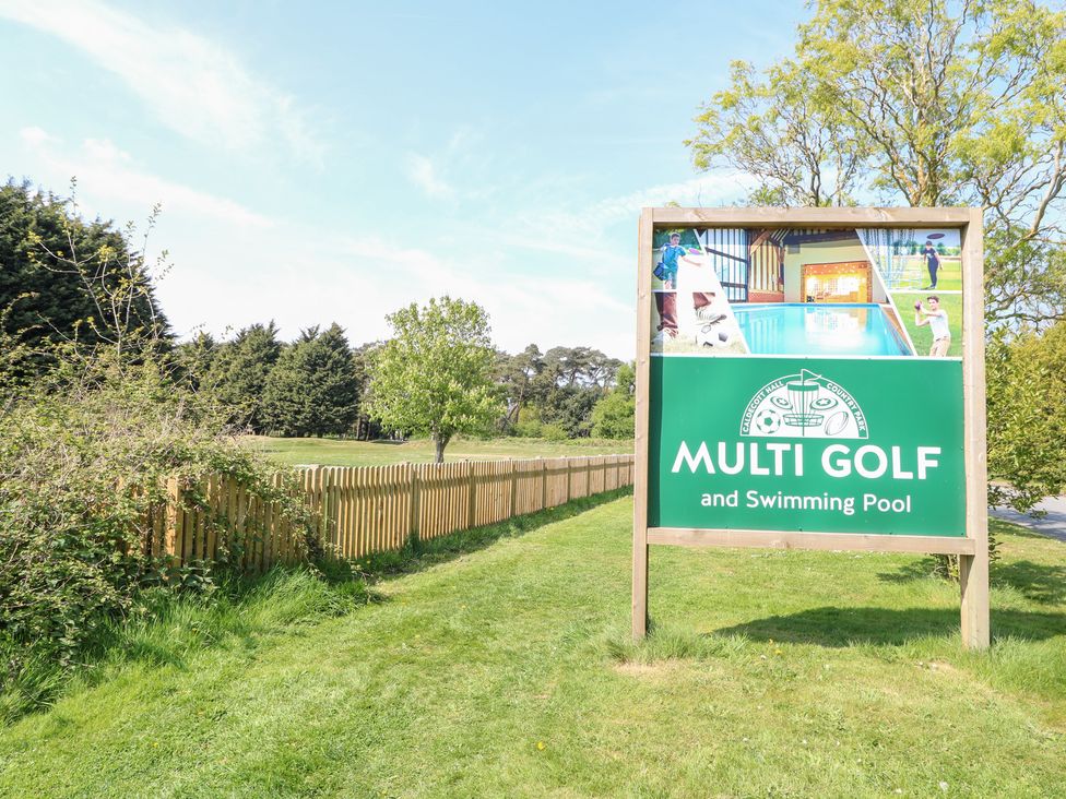 A sign for Multi Golf and Swimming Pool at Number 34 Foxburrow Hang in Great Yarmouth