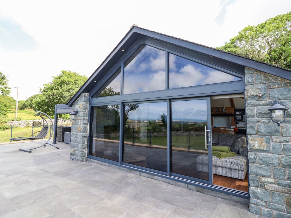 An outdoor area with a view at Perth Y Deri in Llanddwywe