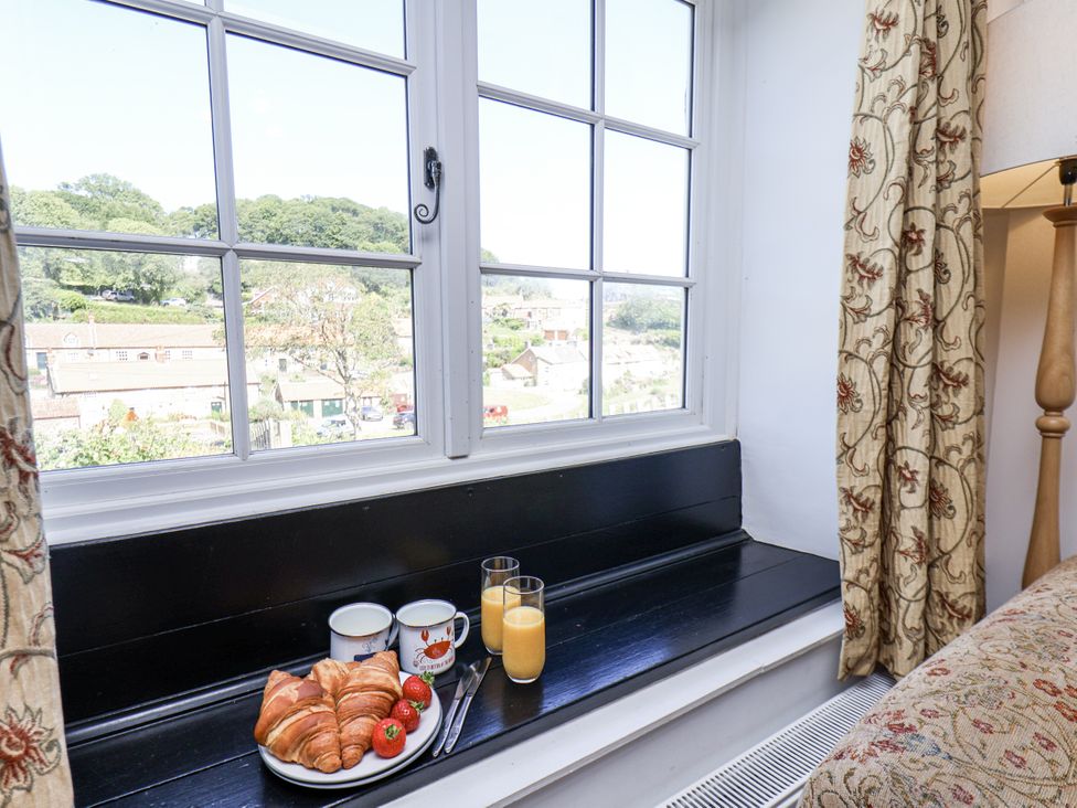 A kitchen window sill with breakfast items at Rigg Cottage in Sandsend