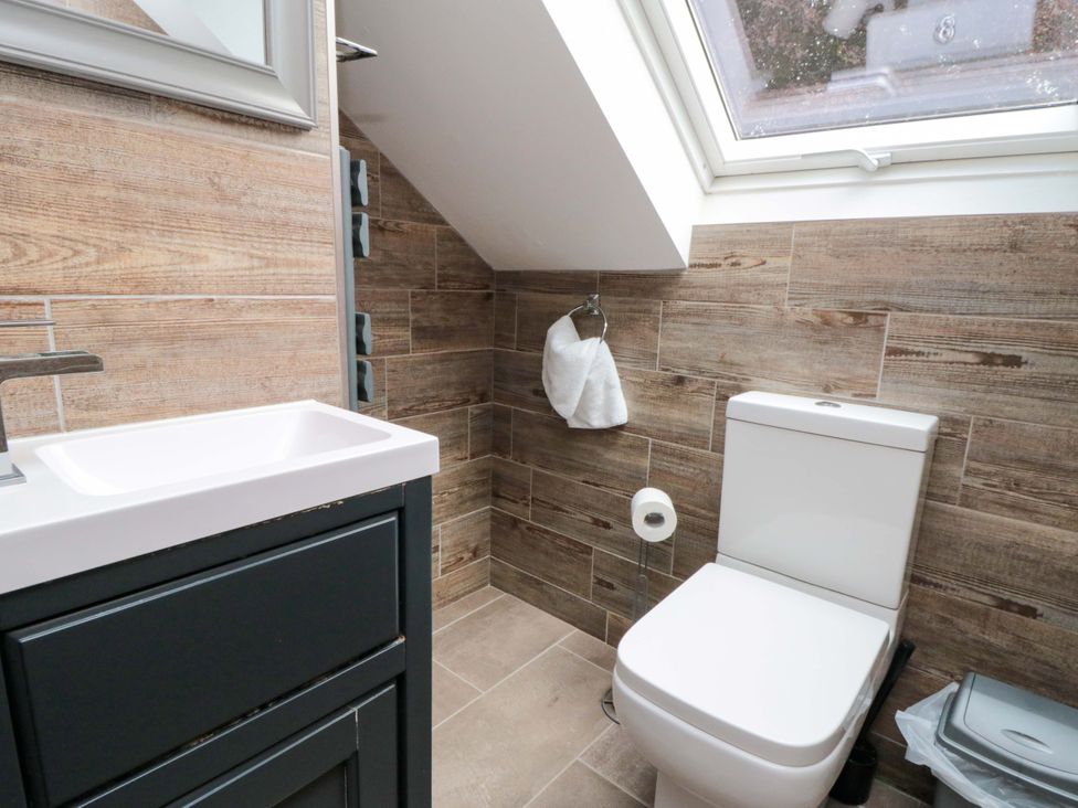 A bathroom with a sink and toilet at Lawnswood