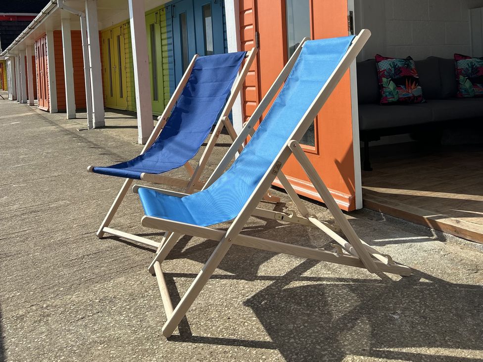 Two deck chairs outside a building at Lawnswood in Brompton-by-Sawdon near Sherburn