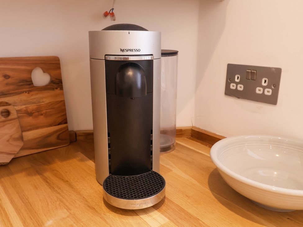 A Nespresso machine and a bowl in a kitchen at 11 Ballygate in Babbacombe