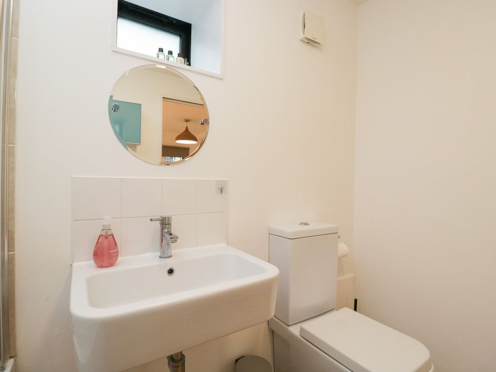 A bathroom with a sink and toilet at 3 The Stoneyard Bath