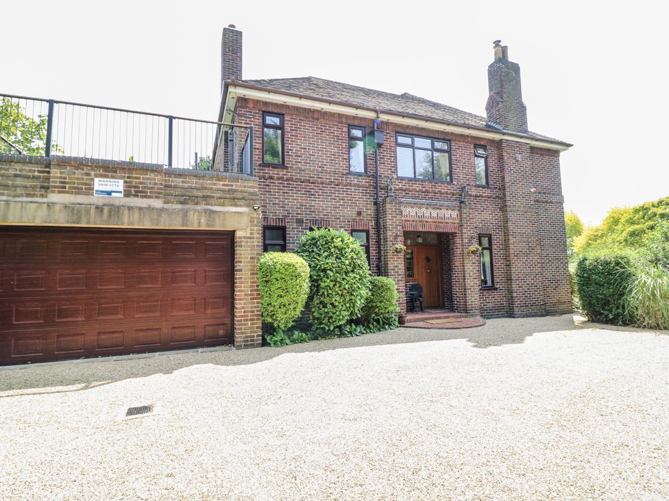 A house with a garage and front door at Bentfield House in Rotherham near Whiston