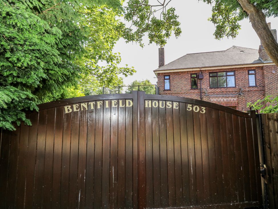 A gate with the name Bentfield House 503 in Rotherham near Whiston