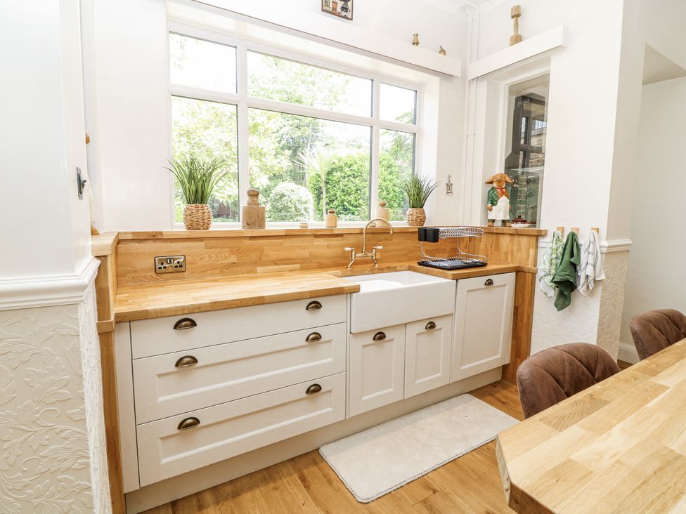 A kitchen with a sink and counter at Bentfield House in Rotherham near Whiston