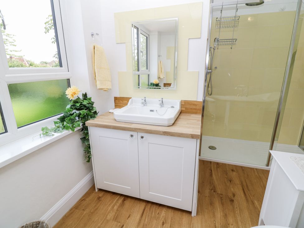 A bathroom with a sink and shower at Bentfield House near Rotherham
