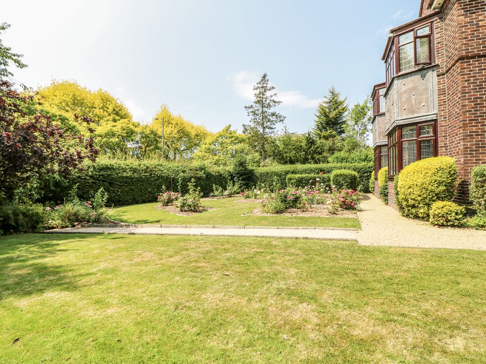 A garden with flowers and a pathway at Bentfield House near Rotherham