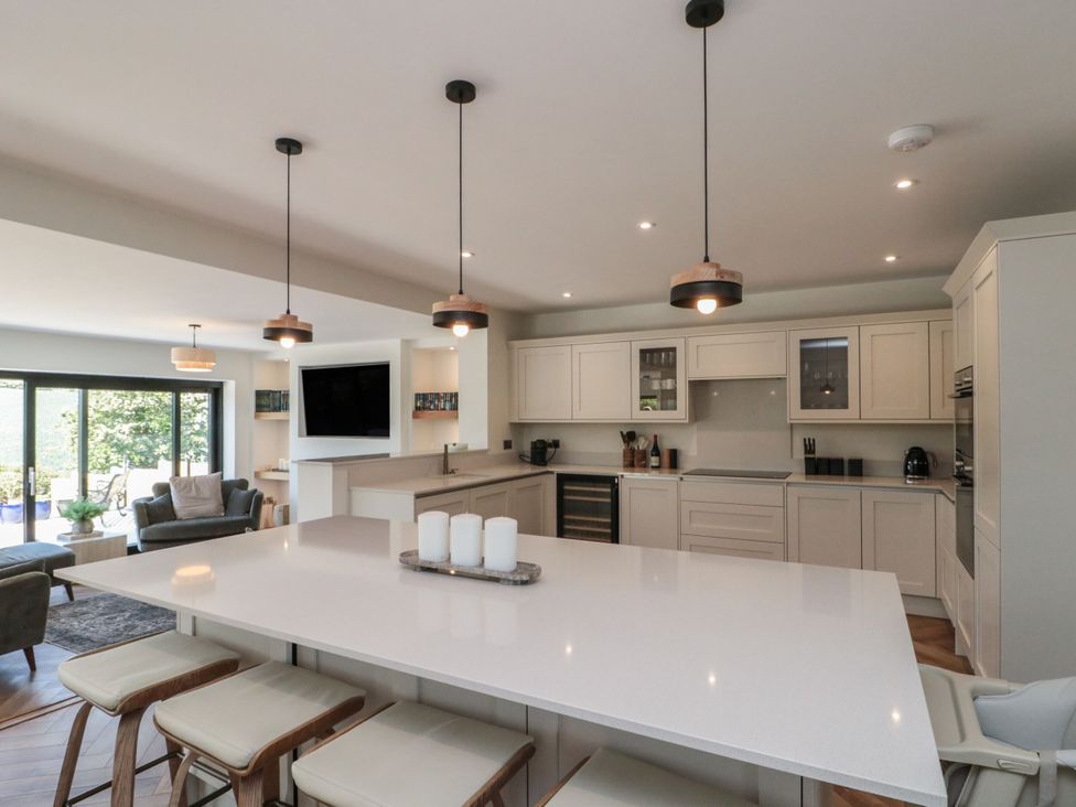 A kitchen with an island and cabinets at 12 Gap Road in Filey
