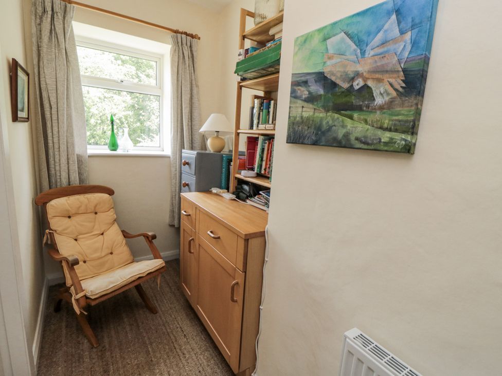An office with a window and bookshelf at Low Muffles Bridge