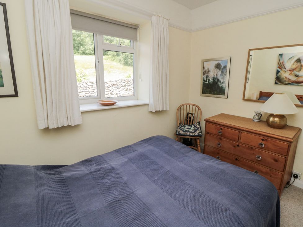 A bedroom with a bed and a window at Low Muffles Bridge