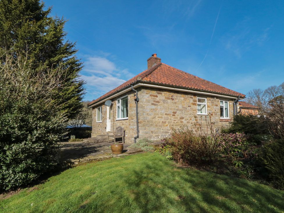 A house with a garden and pathway at Low Muffles Bridge in Hartoft near Rosedale Abbey