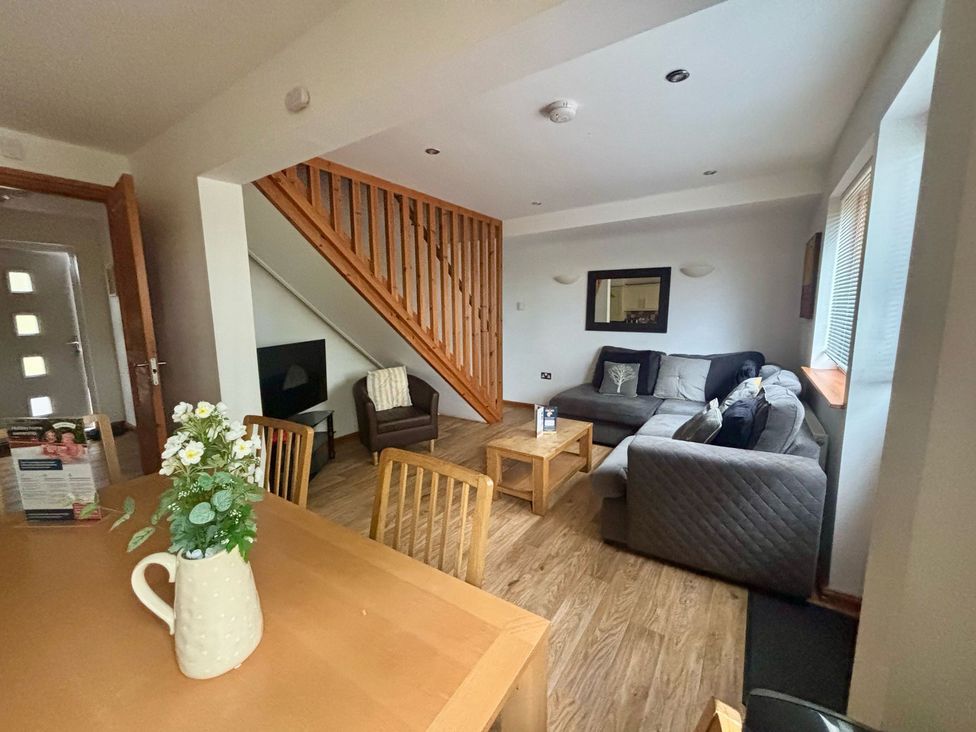 A living room with a sofa and coffee table at Acorn Lodge Finlakes Holiday Park near Chudleigh