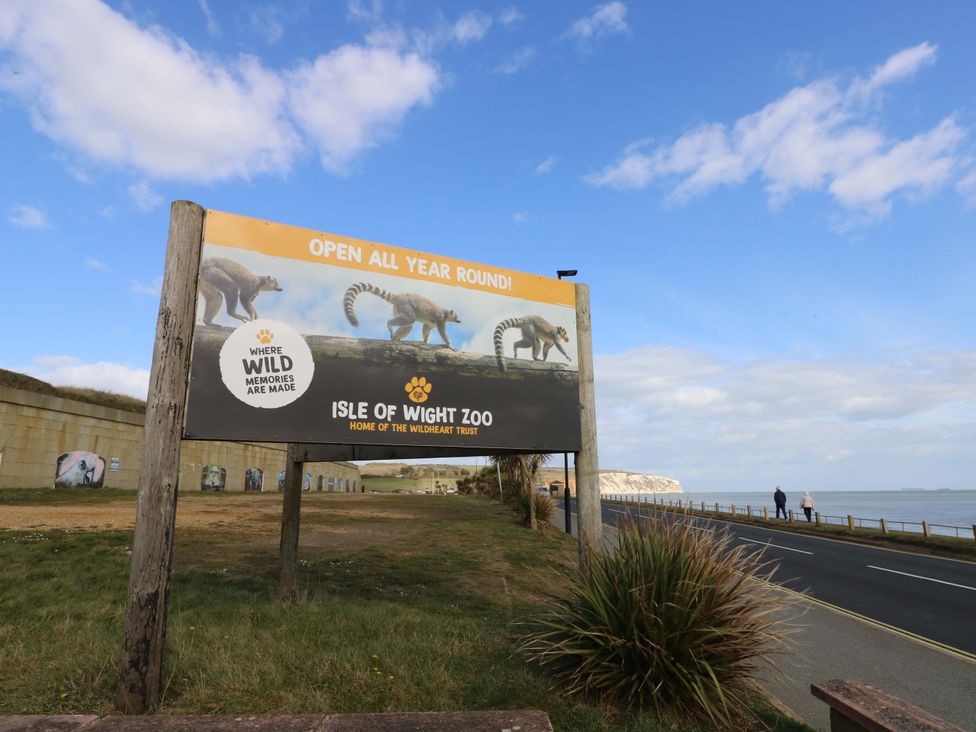 A billboard for Isle of Wight Zoo near a road at No 157 Sandown Bay Holiday Chalet 'Field View' Sandown