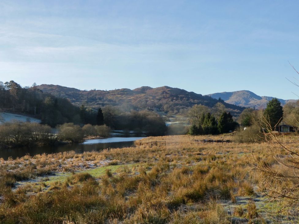 A landscape view featuring hills and a river at Norwood House Ambleside
