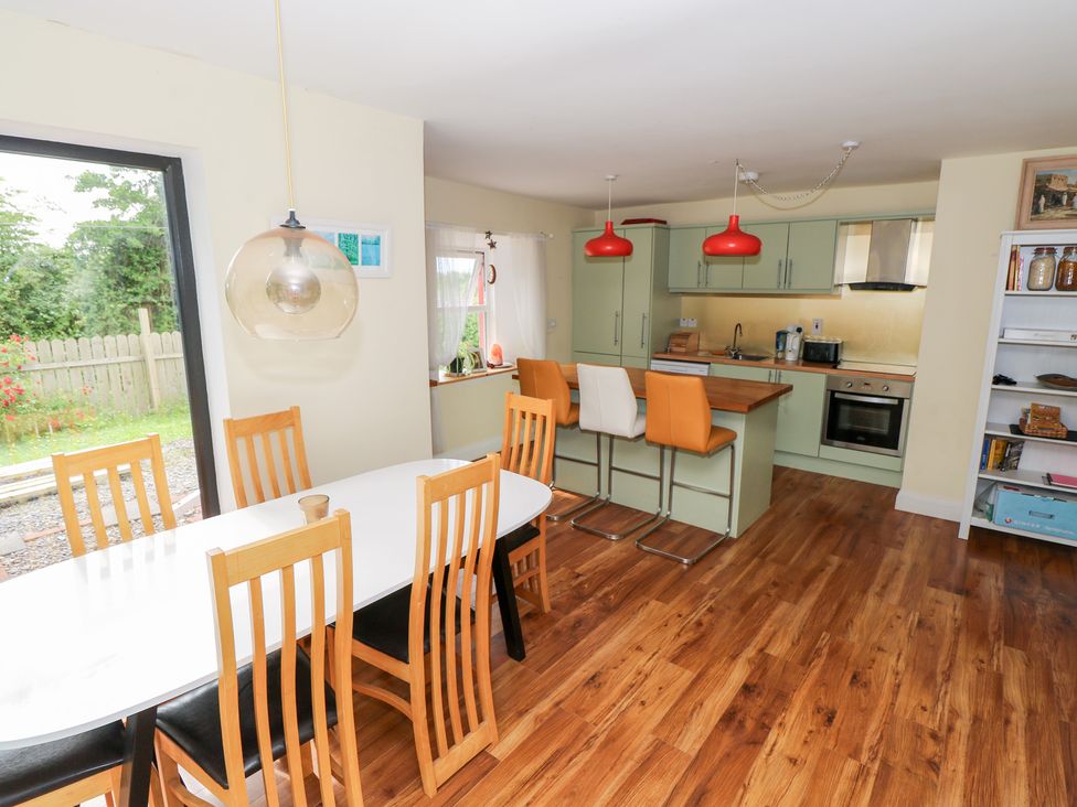 A kitchen with dining area featuring table and chairs at Huath in Carrick on Shannon