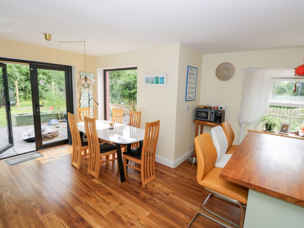 A kitchen with a dining table and chairs at Huath in Carrick on Shannon