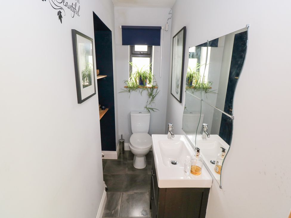 A bathroom with a toilet and sink at Huath in Carrick on Shannon