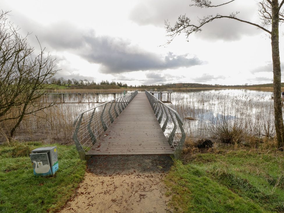 A pathway leading to a bridge over water at Huath in Carrick on Shannon