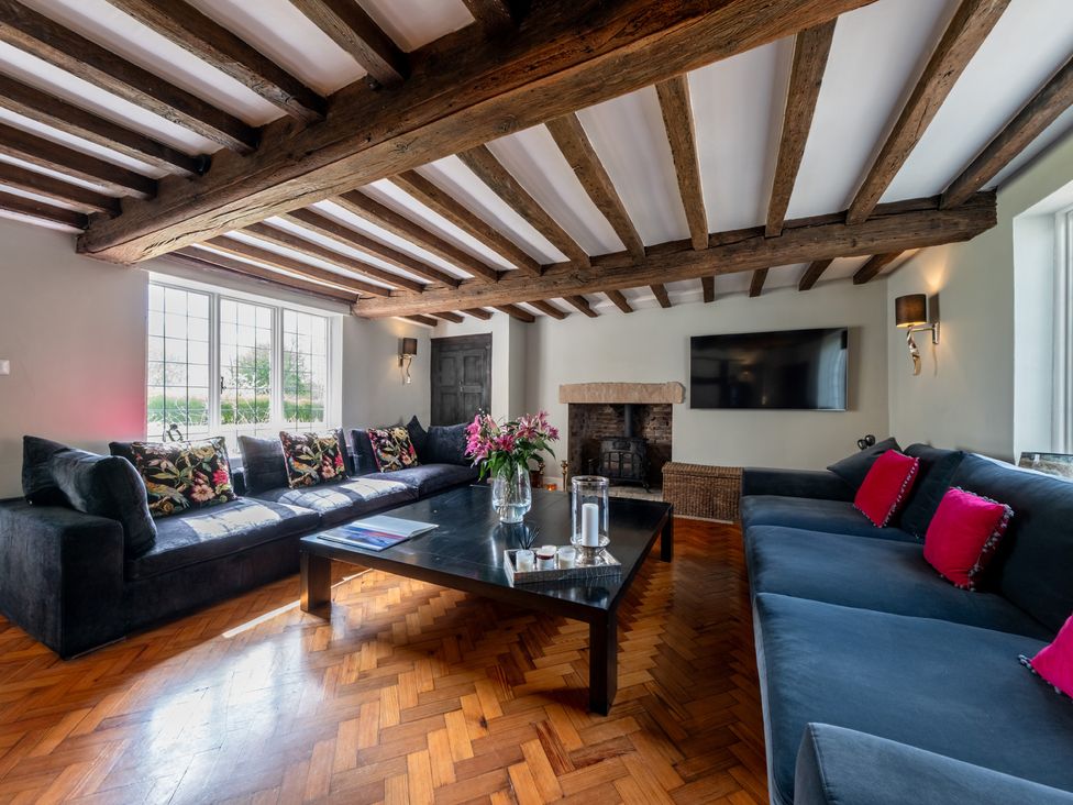A living room with a sofa and coffee table at Hall O'Coole in Broomhall nearn Wrenbury