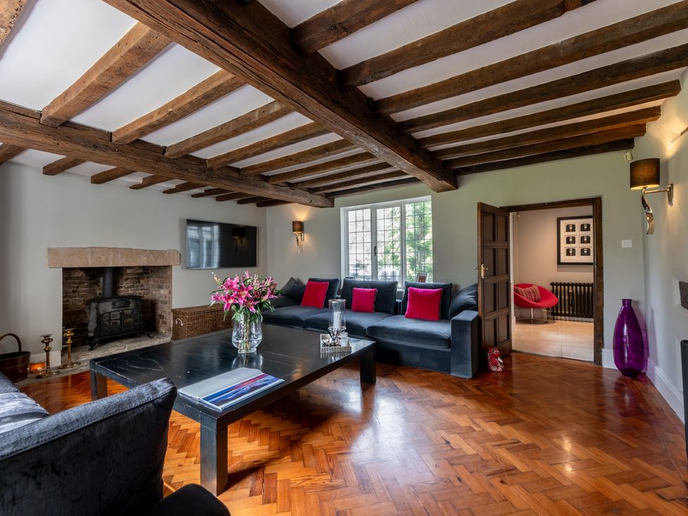 A living room with a sofa and coffee table at Hall O'Coole in Broomhall nearn Wrenbury
