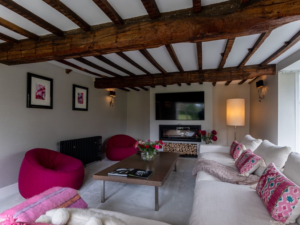 A living room with a sofa and coffee table at Hall O'Coole in Broomhall nearn Wrenbury