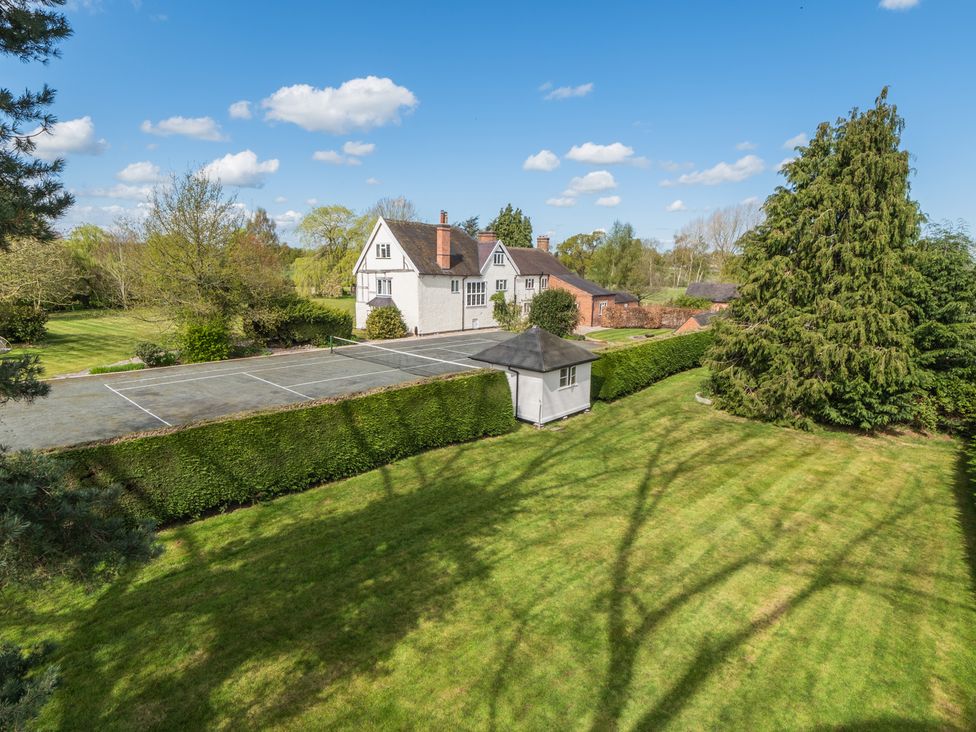 A house with garden and tennis court at Hall O'Coole in Broomhall nearn Wrenbury