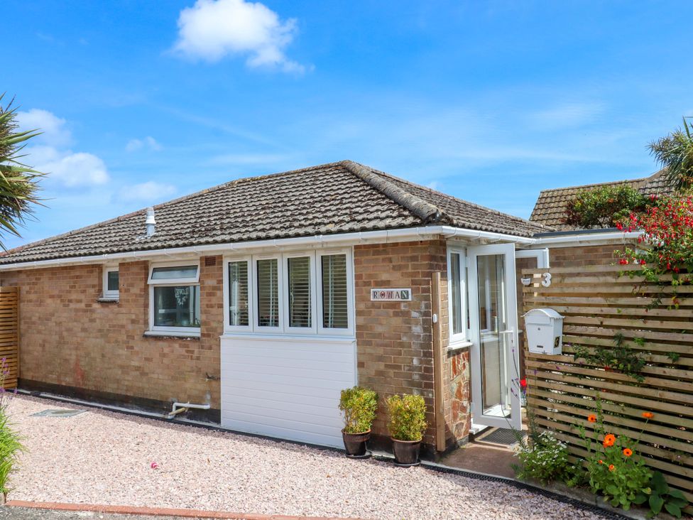A house exterior with a garden and entrance at Rowan in Brixham