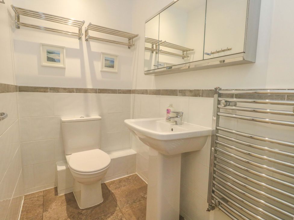 A bathroom with a sink and toilet at Corner Cottage in Preston