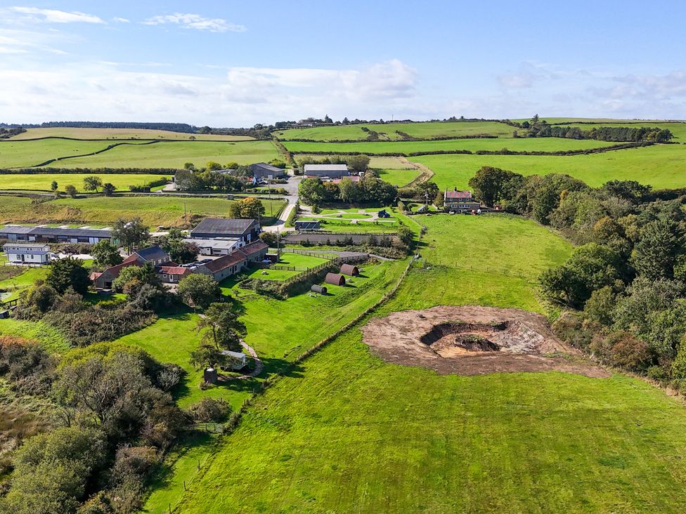An aerial view of fields and buildings at Hare Pod Staintondale near Burniston