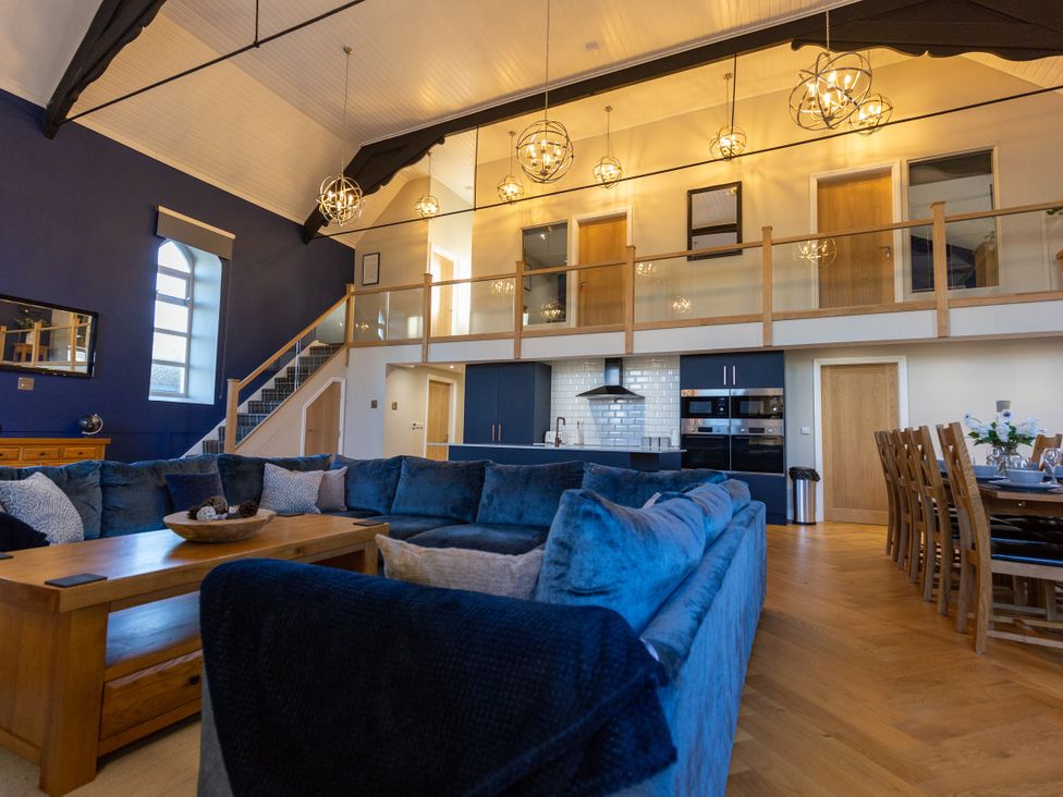 A living room with a sofa and coffee table at Moorsholm View in Saltburn-by-the-Sea