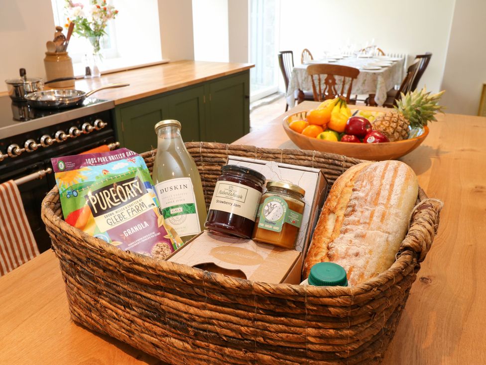 A basket with groceries on a kitchen counter at High Meadow Barn Thornton Rust near Bainbridge