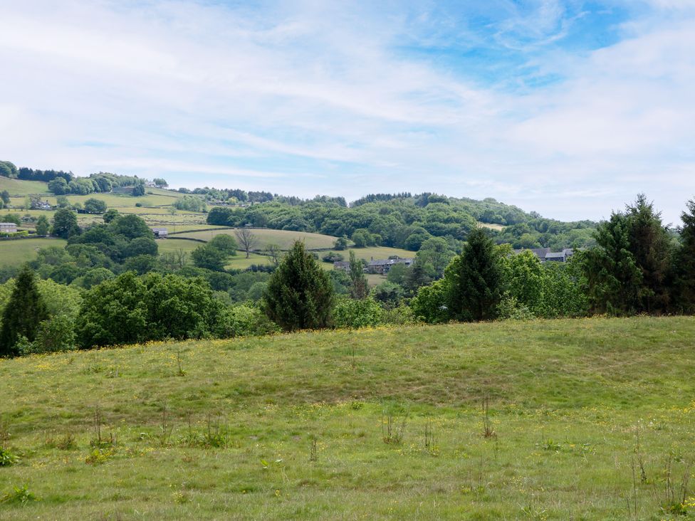 A landscape view of hills and trees at The Stables in Stockport