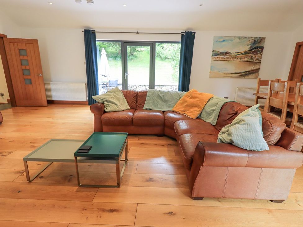 A living room with a sofa and coffee table at Bracken Ground in Coniston