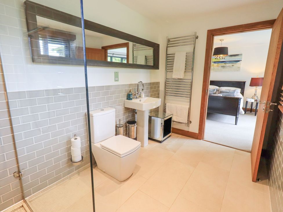 A bathroom with a sink and toilet at Bracken Ground in Coniston