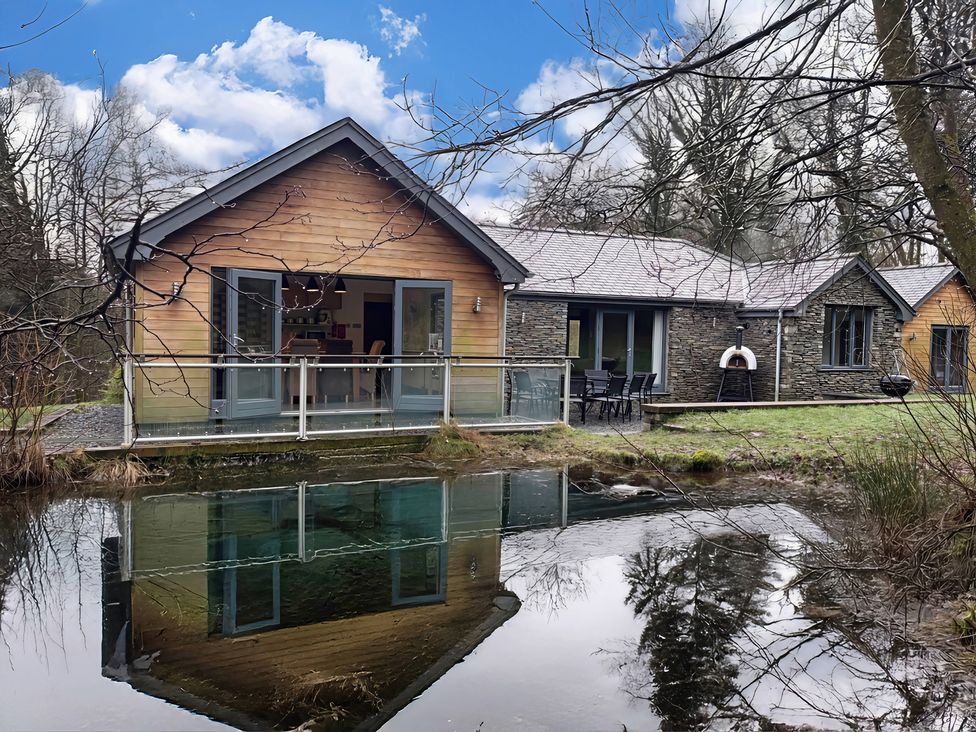 A house with a pond and balcony at Bracken Ground in Coniston