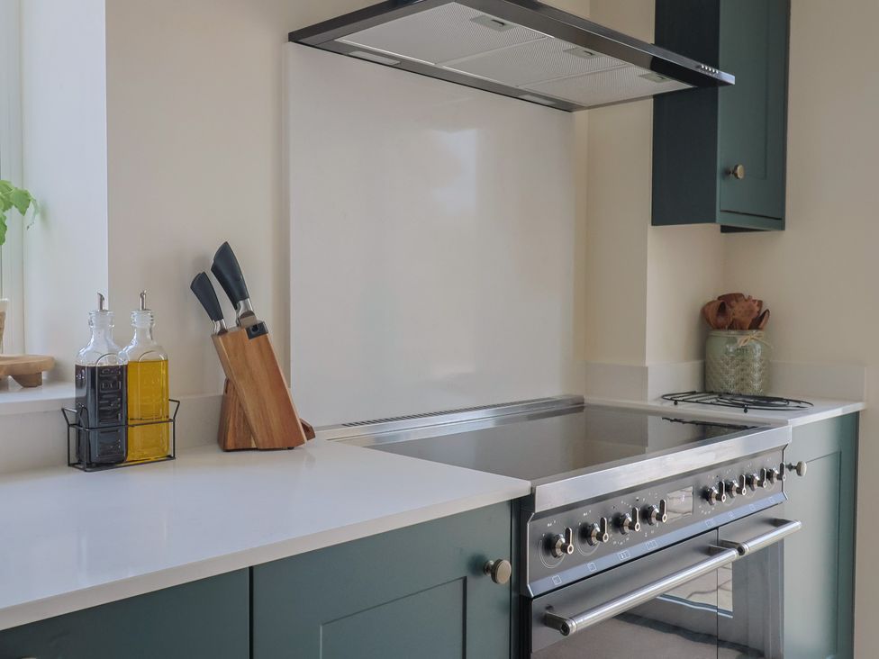 A kitchen with countertop appliances and utensils at Foxes Den in Pendomer near Yeovil, Somerset