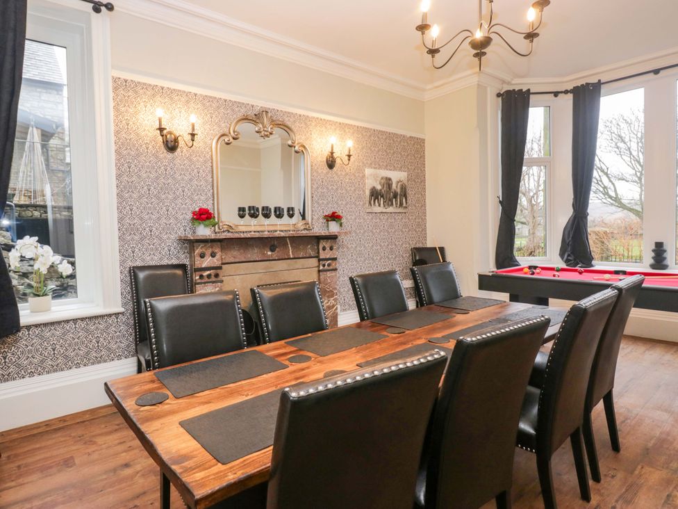 A dining room with a large table and chairs at Rocklands in Shap