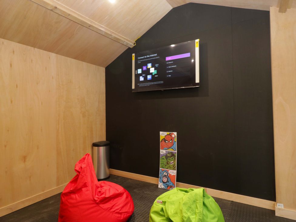 A room with bean bags and a television at Rocklands in Shap