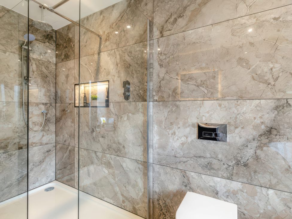 A bathroom with a shower and toilet at The Old Butchers Arms in Sheffield