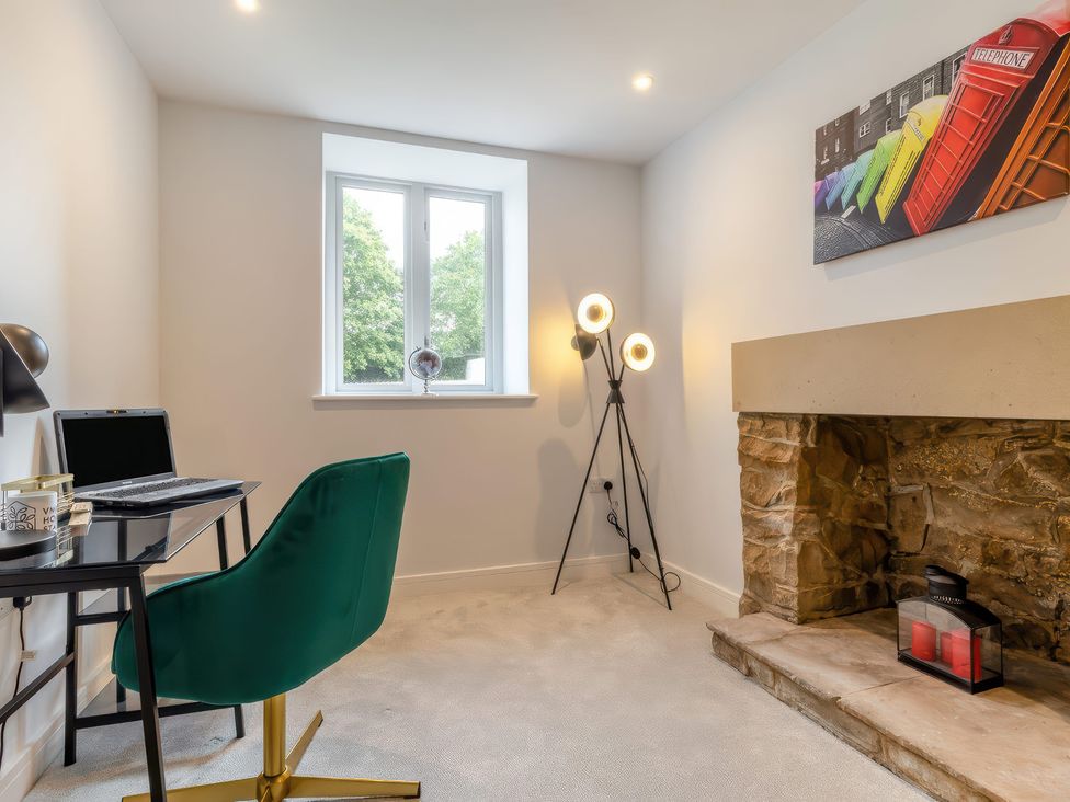 A home office with a desk and chair at The Old Butchers Arms in Sheffield