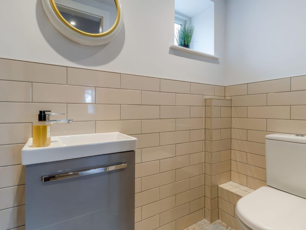 A bathroom with a toilet and sink at The Old Butchers Arms in Sheffield