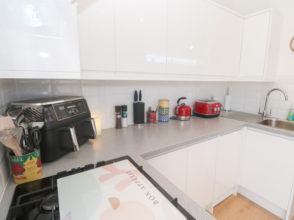 A kitchen with utensils and appliances at Carn Brea in Redruth