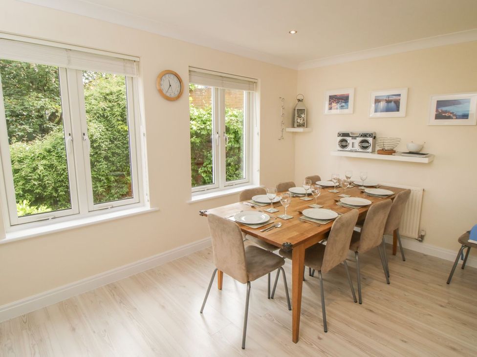 A dining room with a table and chairs at The Shipwrights in Whitby
